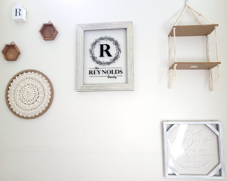 Wall Art Collage with Last name , shelf, quote, crochet circle, and wood art with empty space in bottom left.