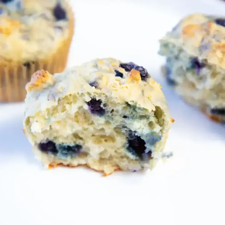 Blueberry high protein cottage cheese muffin on white plate