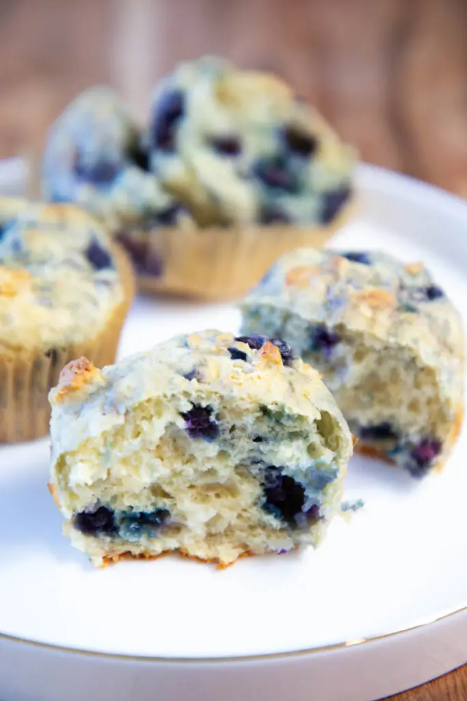 Blueberry high protein cottage cheese muffin on white plate